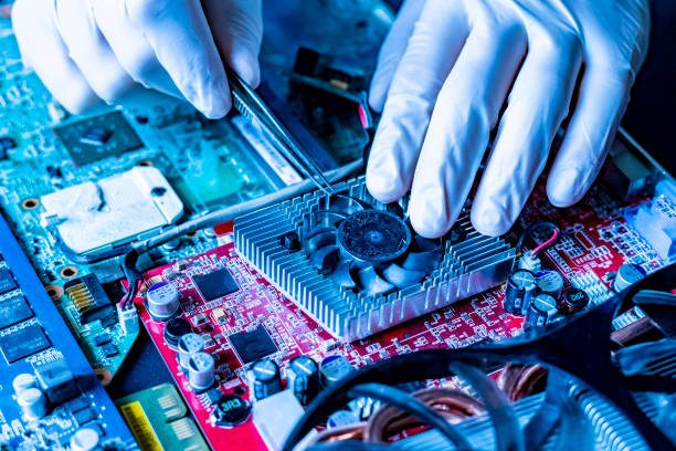 hands attach and assembre the cooler fan to the videocard chip slot hands attach and assembre the cooler fan to the videocard chip slot